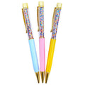 Happy Days And Funny Nights confetti-filled ballpoint pen set in bright colors with gold trim
